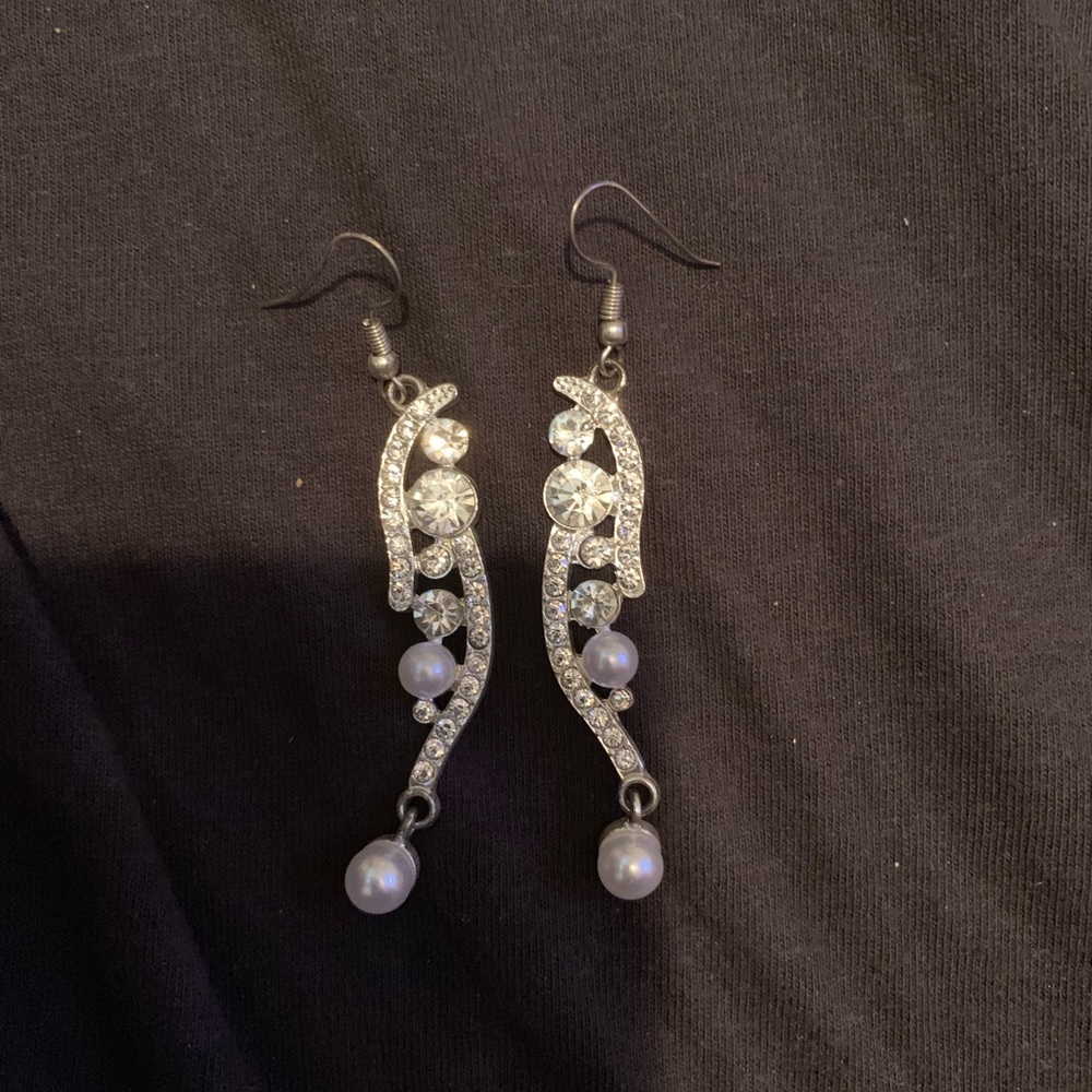 Silver earrings.